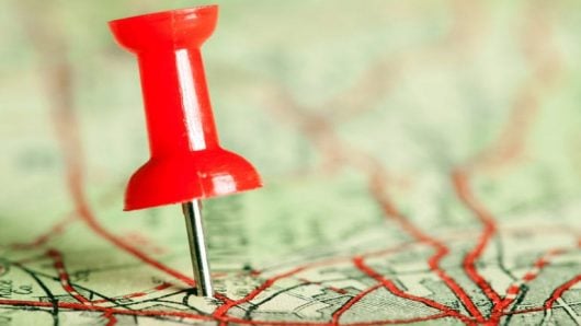 push pin on a map